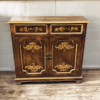 handpainted small brown cabinet with 2 doors, with scrolls in gold accents