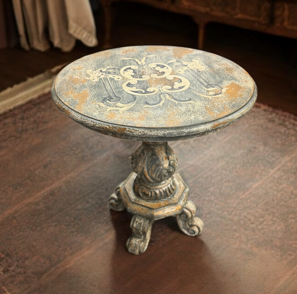 distressed round pedestal table in soft blue colors