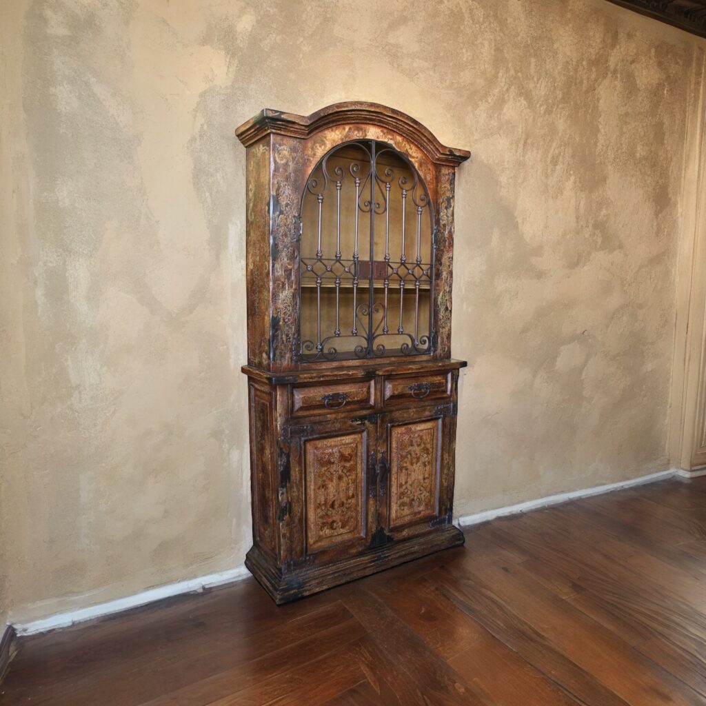 Old world hancrafted Peruvian Armoire with handcrafted doors, arch top, 2 doors at the bottom, hand painted in natural caramel finish showing the wood