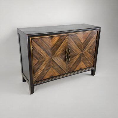ART DECO WOOD CHEST WITH BLACK BODY AND GEOMETRIC DESIGNS ON DOORS IN SOFT BROWN COLORS WITH METAL HANDLES